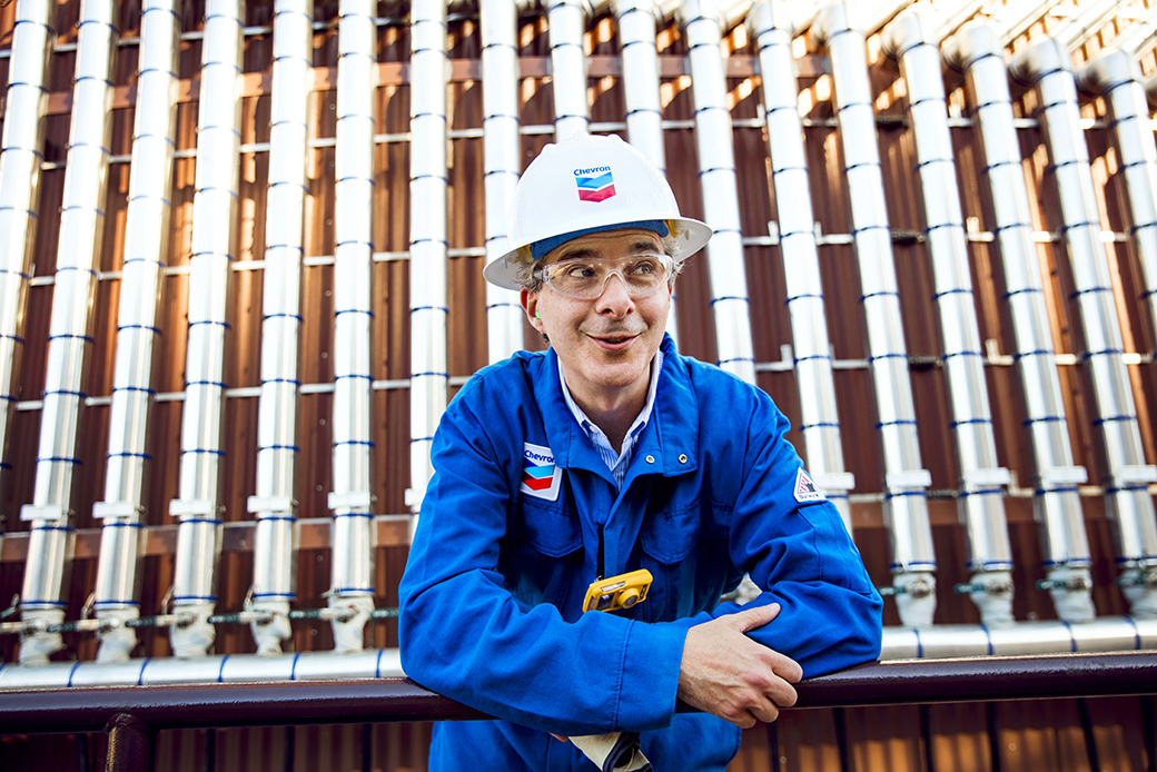 a chevron worker onsite wearing a hardhat