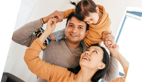 a young family smiling