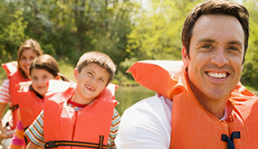 family wearing life jackets